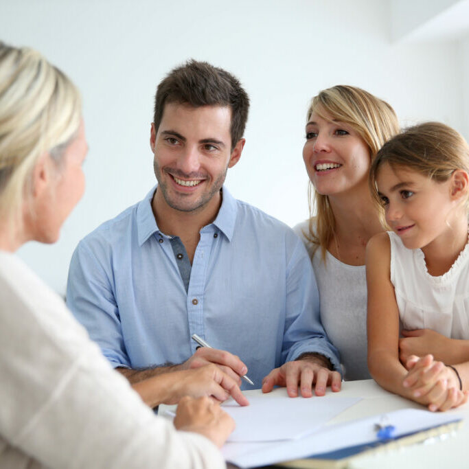 Family meeting real-estate agent for house investment